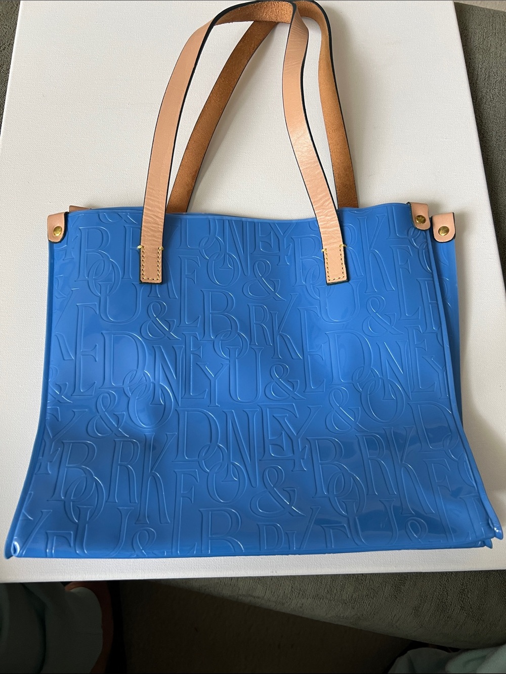 Dooney & Bourke Signature Embossed Tote Bag with Tan Leather Handles